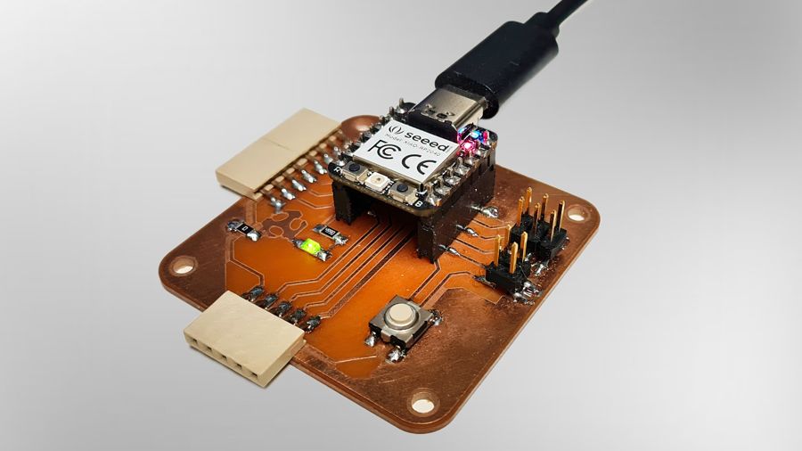 Milled copper breakout PCB with a XIAO RP2040 module, LED and push button